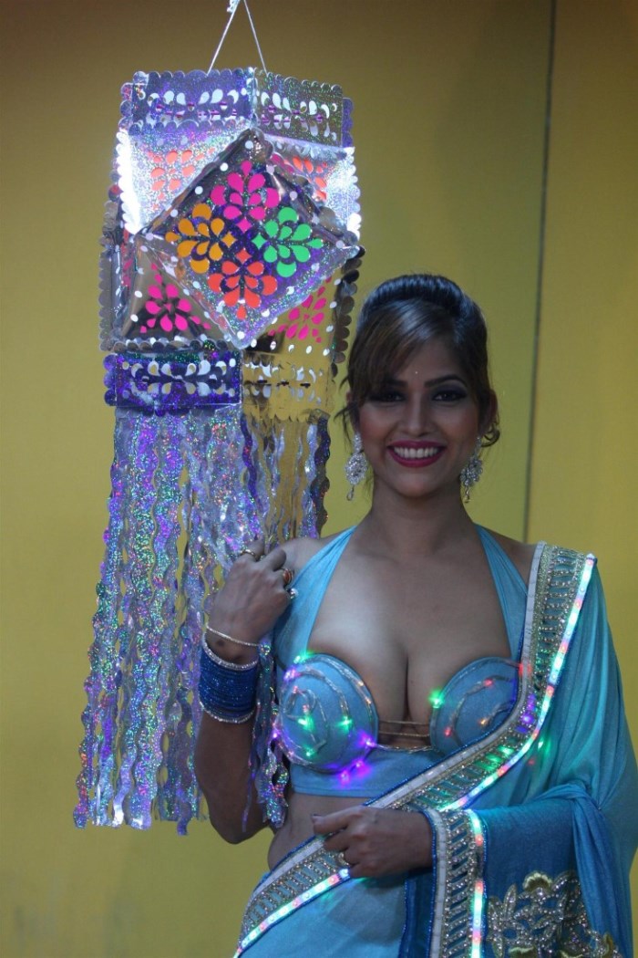Tanisha Singh  Hot Blue Saree Photoshoot Stills