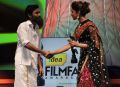 Dhanush, Deepika at 59th South Indian Filmfare Awards Stills