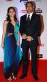 Mr. Deepak Lamba (CEO, Worldwide Media) with his wife @ 61st Britannia Filmfare Awards 2015 Photos