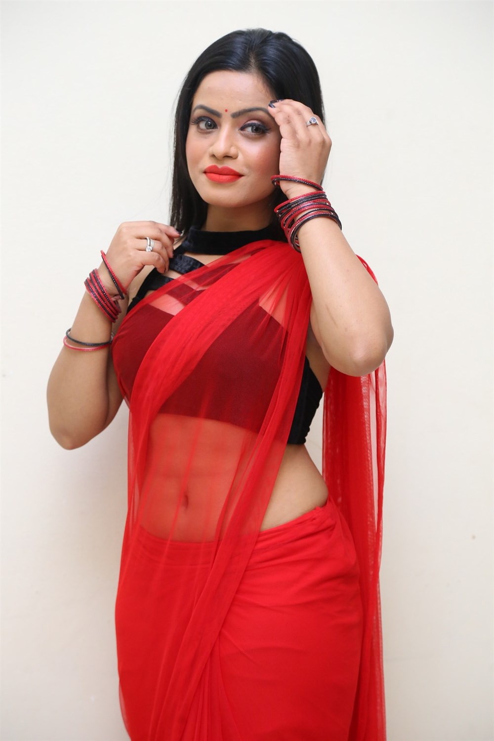 Aasma Syed Hot Red Saree Stills @ Premika Audio Release | Moviegalleri.net