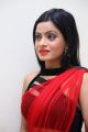 Aasma Sayed Hot Red Saree Stills @ Premika Audio Launch