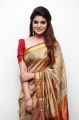 Kannai Nambathey Actress Aathmika in Silk Saree HD Photos
