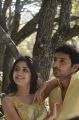 Poonam Kaur, Munna in Acharam Tamil Movie Stills