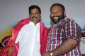 Director Guru at Atharampalli Aarambam Movie Audio Launch Photos