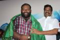 Director Guru at Atharampalli Aarambam Movie Audio Launch Photos