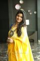 Actress Aishwarya Rajesh Yellow Saree Stills HD @ Vijay Devarakonda Movie Launch