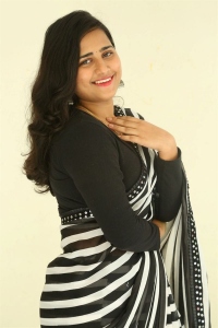 Actress Akhila Akarshana in Saree Stills