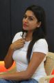 Actress Akshitha Latest Hot Photos in White T Shirt.