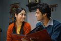 Mia George, Sathya in Amara Kaaviyam Movie Stills