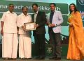 Krishnamachari Srikkanth recieving the Inspiring Icon award from MLA Natraj with Veera Raghavlu & Sonia Agarwal