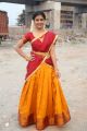 Telugu Actress Amrutha Photos in Red Yellow Half Saree