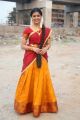 Padaiveeran Actress Amritha Aiyer Photos in Red Yellow Half Saree