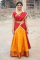 Padaiveeran Actress Amritha Aiyer Photos in Red Yellow Half Saree