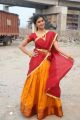 Actress Amritha Aiyer Photos in Red Yellow Half Saree