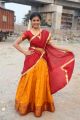 Telugu Actress Amrutha Photos in Red Yellow Half Saree