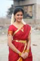 Actress Amrutha Photos in Red Yellow Half Saree