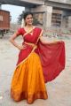 Actress Amritha Aiyer Photos in Red Yellow Half Saree