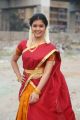 Telugu Actress Amrutha Photos in Red Yellow Half Saree