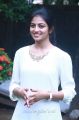 Actress Rakshita Cute Photos in White Top & Blue Fade Jeans