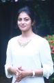 Actress Rakshita Cute Photos in White Top & Blue Fade Jeans