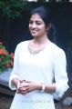 Actress Anandhi Cute Photos in White Top & Blue Fade Jeans
