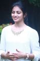 Actress Anandhi Cute Photos in White Top & Blue Fade Jeans