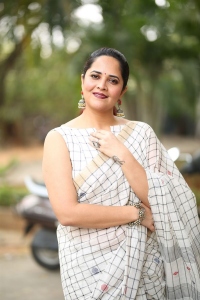 Actress Anasuya New Saree Stills @ Razakar Movie Song Launch