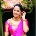 Actress Anasuya Saree Photoshoot Stills