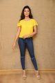 Actress Anisha Ambrose Pics in Yellow Top & Tight Blue Jeans Dress