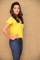 Actress Anisha Ambrose Pics in Yellow Top & Tight Blue Jeans Dress