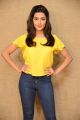 Actress Anisha Ambrose Pics in Yellow Top & Tight Blue Jeans Dress