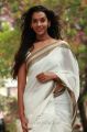 Potugadu Actress Anu Priya in White Saree Images