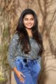 Anupama Parameswaran in Ankle Jeans Photos @ Sai Dharam Tej Karunakaran Film Press Meet