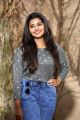 Anupama Parameswaran in Ankle Jeans Photos @ Sai Dharam Tej Karunakaran Film Press Meet