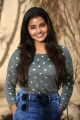 Anupama Parameswaran in Ankle Jeans Photos @ Sai Dharam Tej Karunakaran Film Press Meet