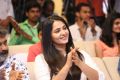 Actress Anushka Cute Smiling Photos @ The World of Baahubali Press Meet