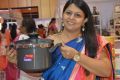 Alpa Jain seen showing Prestige Clip on a new varient cooker launched at the expo