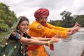 Saranya Mohan, Vineeth in Arundhati Vettai Movie Stills