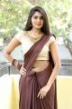 Actress Aslesha Varma Hot Saree Stills @ Sahacharudu Movie Audio Launch