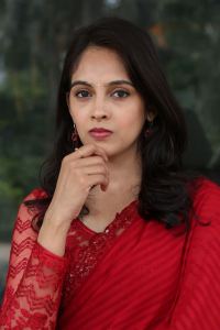 Actress Aswini Ayaluru in Red Saree Stills