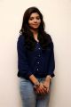 Actress Athulya Ravi Stills in Blue Shirt & Faded Jeans Pant