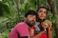 Vignesh, Divya Nagesh in Bhuvanakkadu Tamil Movie Stills