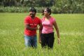 Vignesh, Divya Nagesh in Bhuvana Kaadu Hot Stills