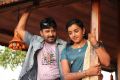 Vignesh, Divya Nagesh in Bhuvana Kaadu Movie Stills