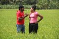 Vignesh, Divya Nagesh in Bhuvana Kaadu Movie Stills