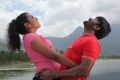 Vignesh, Divya Nagesh in Bhuvana Kaadu Hot Stills