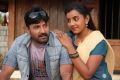 Vignesh, Divya Nagesh in Bhuvanakkadu Movie Stills