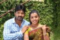 Vignesh, Divya Nagesh in Bhuvanakaadu Movie Stills