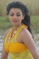 Kajal Hot in Yellow Skirt at Goa Beach