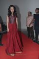 Gorgeous Catherine Tresa in Red Dress at Iddarammayilatho Audio Launch